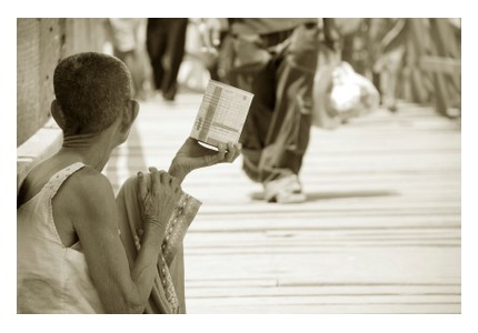 A Cambodian woman begging, ©iStockphoto.com/ruchos