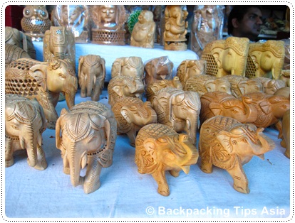 Shopping at Dilli Haat, some wooden elephants at the market