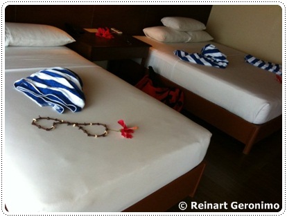 Bedroom at Dos Palmas Palawan resort and hotel