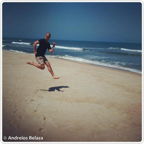 Jumping high on a beach in Hoi An