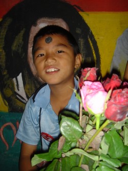 Local boy at Rasta Cafe in Chiang Mai
