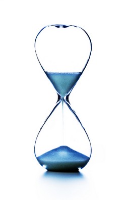 Running hour glass, Hour glass chaep asia flights. ©iStockphoto.com/THEPALMER