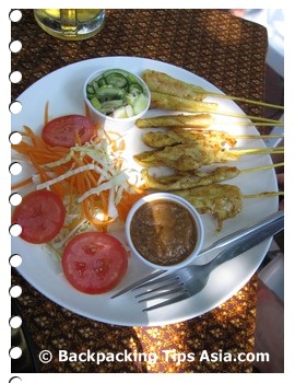 Satay chicken at a restaurant in Soi Rambuttri in Bangkok, Thailand